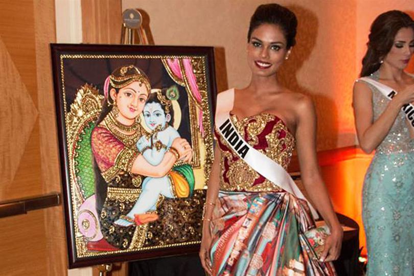 Noyonita Lodh, Miss Universe India 2014 with her auction gift